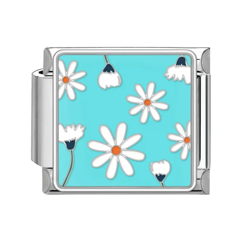 Charm plateado flores blancas