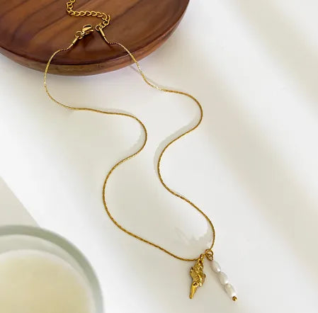 Collar caracol con conchita
