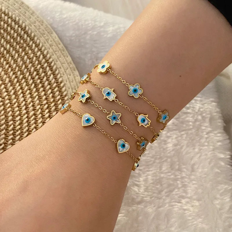 Pulsera ojitos con perla madre