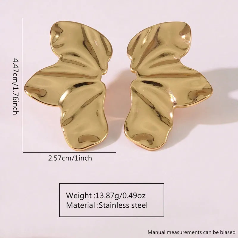 Aretes mitad de flor dorados
