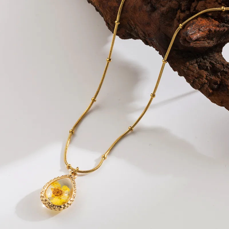 Collar flor encapsulada