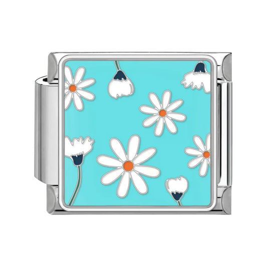 Charm plateado flores blancas