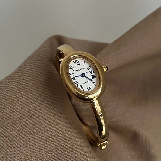 Reloj Bangle dorado