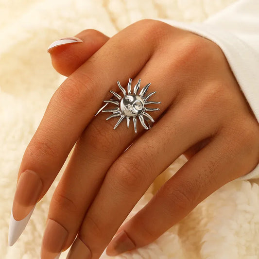 Anillo sol con cara plateado
