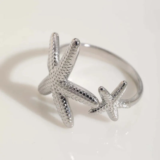 Anillo estrellas plateado