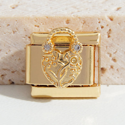 Charm dorado corazon