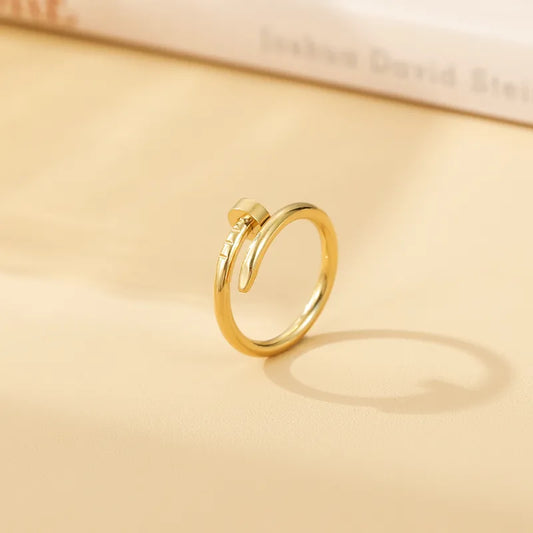 Anillo clavo dorado