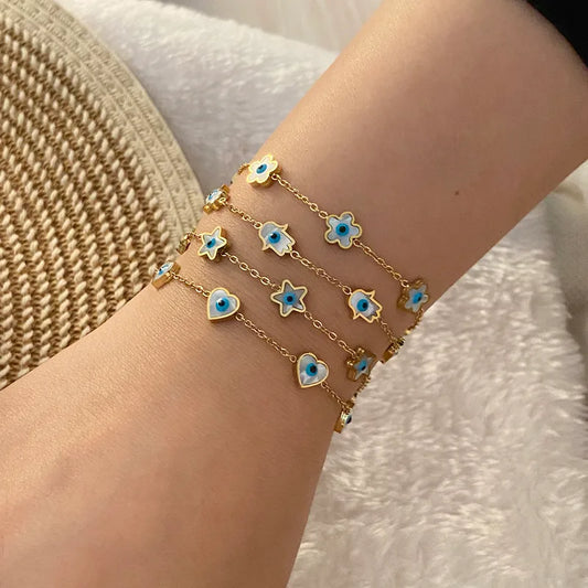 Pulsera ojitos con perla madre